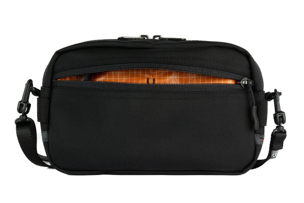 A Side Effect in Black 525 Ballistic with Zest (orange with white grid) 210 Cerylon interior.